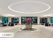 Thumbnail 32 of 62 - Spacious open-concept lobby with luxury finishes and seating areas at Xenia Apartments in Golden Valley Minnesota