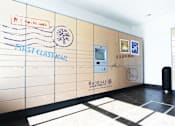Thumbnail 40 of 42 - Resident package lockers at The Biltmore Apartments in Omaha, Nebraska
