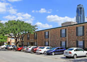 Thumbnail 16 of 19 - Apartments near the Galleria with brick exteriors, covered parking and courtyard setting at Plantation apartments in Houston.