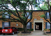 Thumbnail 14 of 19 - Apartments near the Galleria with brick exteriors, covered parking and courtyard setting at Plantation apartments in Houston.