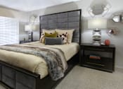 Thumbnail 26 of 30 - Spacious bedroom that can fit a king size bed with walk-in closet and attached bathroom at Preston Village Apartments in north Dallas