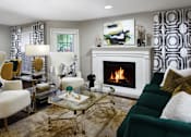 Thumbnail 2 of 30 - Spacious apartments with wood plank floors, woodburning fireplace, French door, and oversized windows at Preston Village Apartments