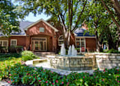 Thumbnail 1 of 30 - Luxury apartments in north Dallas with beautiful landscaping, scenic views, and red brick exteriors at PrestonVillage Apartments