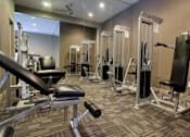 Thumbnail 7 of 30 - Luxury apartments with a fitness center in a gated community at Preston Village Apartments in North Dallas