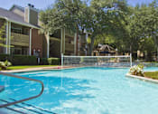 Thumbnail 25 of 30 - Luxury apartments with beautiful fountains, beautiful landscaping, gazebo, spa, and swimming pool with poolside lounge chairs, grilling station and scenic views at Preston Village Apartments in north Dallas