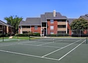 Thumbnail 16 of 30 - Luxury apartments with tennis court, red brick exteriors, beautiful landscaping, and spacious balconies at Preston Village Apartments in North Dallas