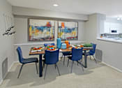 Thumbnail 5 of 30 - Spacious apartments with dining room and kitchen with white cabinets at Preston Village Apartments in north Dallas
