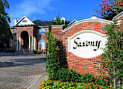 Thumbnail 1 of 73 - Gated luxury apartment community in north Dallas with red brick exteriors at The Saxony Apartments