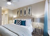 Thumbnail 4 of 20 - Luxury apartments with spacious bedrooms, walk-in closets, and ceiling fans at Tuscany Gate Apartments in Houston.