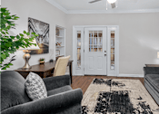 Thumbnail 15 of 26 - Huge office space, spacious den with built-in shelves, hardwood floors, and private backyard patios at Tuscany Villas in Houston.