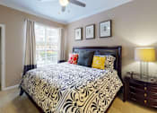 Thumbnail 21 of 36 - Luxury apartments with spacious bedrooms, walk-in closets, and ceiling fans at Tuscany Apartments in Houston.