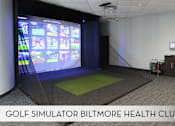 Thumbnail 31 of 36 - A room with a golf simulator at the Biltmore Health Club.