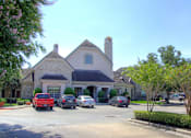 Thumbnail 30 of 40 - Gated community in Houston with attached and detached garages, covered parking, 24-hour fitness center with showers and lockers, beautiful landscaping and scenic views.