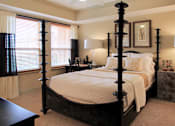 Thumbnail 6 of 36 - Luxury apartments with master bedroom to fit a king size bed, attached master bathroom and walk-in closet at Villa Piana Apartments in Dallas