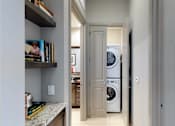 Thumbnail 41 of 45 - Luxury apartments with stacked font loading washer and dryer at Le Palais Apartments in Houston.