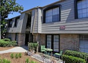 Thumbnail 12 of 22 - Gated apartment community close to the Galleria with pool, spa, poolside lounge chairs, lush landscaping, beautiful landscaping, and neighborhood setting.
