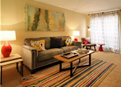 Thumbnail 20 of 22 - Spacious one and two bedroom floor plans with white brick accent walls at Waters of Winrock Apartments in Houston.