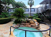 Thumbnail 16 of 22 - Gated apartment community close to the Galleria with pool, spa, poolside lounge chairs, lush landscaping, beautiful landscaping, and neighborhood setting.