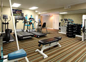 Thumbnail 27 of 38 - Fitness center at Woodlake Oaks Apartments in Houston, Texas