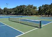 Thumbnail 30 of 38 - Tennis Courts at Woodlake Community Park near Woodlake Oaks Apartments, Houston Texas