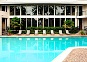 Thumbnail 2 of 42 - Gated apartments with 4 swimming pools, convenient bayou location and scenic views at Woodlake on the Bayou Apartments in Houston.