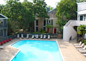 Thumbnail 29 of 42 - Gated apartments with 4 swimming pools, convenient bayou location, lush landscaping and scenic views at Woodlake on the Bayou Apartments in Houston.