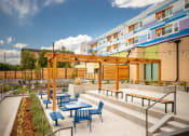 Thumbnail 3 of 13 - Outdoor Living Spaces at Arroyo Village Apartments, Denver, 80204