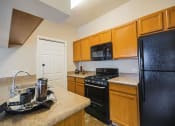 Thumbnail 36 of 39 - One Bedroom Kitchen at Remington Apartment Homes, Romeoville, IL