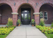 Thumbnail 2 of 39 - Leasing Center Entrance at Remington Apartment Homes, Romeoville, 60446