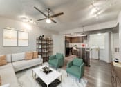 Thumbnail 1 of 27 - an open living room and kitchen with a ceiling fan  at Vibe on Riverside, Austin, TX, 78741