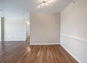 Thumbnail 9 of 13 - a bedroom with hardwood floors and white walls  at Collective on Riverside, Austin, Texas