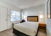 Thumbnail 3 of 8 - a bedroom with a bed and a window  at Waterford Studios, Austin