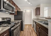 Thumbnail 7 of 13 - our apartments offer a kitchen  at Collective on Riverside, Texas