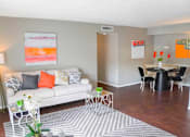 Thumbnail 1 of 27 - Living Room With Kitchen View at The Entro at Midtown, Texas, 75230