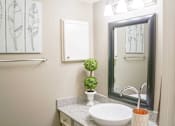 Thumbnail 11 of 27 - Renovated Bathrooms With Quartz Counters at The Entro at Midtown, Dallas, TX, 75230