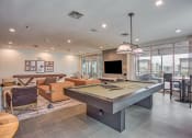 Thumbnail 16 of 26 - a games room with a pool table and a flat screen tv  at Presidium Revelstoke, Fort Worth