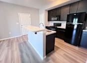 Thumbnail 65 of 111 - Kitchen with White Island at Hebron Station Apartments, Hebron, KY, 41048