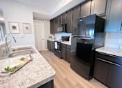 Thumbnail 31 of 111 - Kitchen with Microwave at Hebron Station Apartments, Hebron, KY, 41048