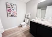 Thumbnail 46 of 111 - Bathroom with a Painting on a Wall at Hebron Station Apartments, Kentucky