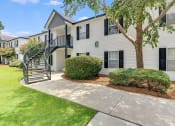 Thumbnail 9 of 32 - a white building with a spiral staircase in front of it at Dothan Farms, Dothan