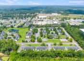 Thumbnail 30 of 32 - an aerial view of a neighborhood with green grass and trees at Dothan Farms, Alabama, 36305
