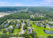 Thumbnail 32 of 32 - an aerial view of a neighborhood with green grass and trees at Dothan Farms, Dothan, AL