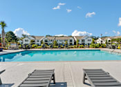 Thumbnail 11 of 24 - Swimming Pool With Relaxing Sundecks at Baldwin Farms Apartments, Robertsdale
