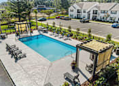 Thumbnail 9 of 24 - Invigorating Swimming Pool at Baldwin Farms Apartments, Robertsdale, AL