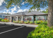 Thumbnail 4 of 25 - Clubhouse Exterior at Ashton Oaks, New Port Richey, Florida