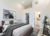 Thumbnail 43 of 46 - a bedroom with a bed and a closet at The Mobile Lofts, Alabama, 36604