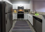 Thumbnail 11 of 25 - Modern Kitchen at Ashton Oaks, Florida, 34654
