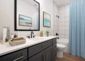 Thumbnail 5 of 7 - a bathroom with a sink and a toilet at The Mobile Lofts, Alabama
