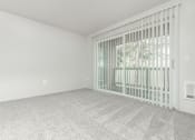 Thumbnail 38 of 55 - Orchard Park Apartments Living Room Patio Image