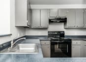 Thumbnail 23 of 55 - Orchard Park Apartments 3 Bedroom Kitchen